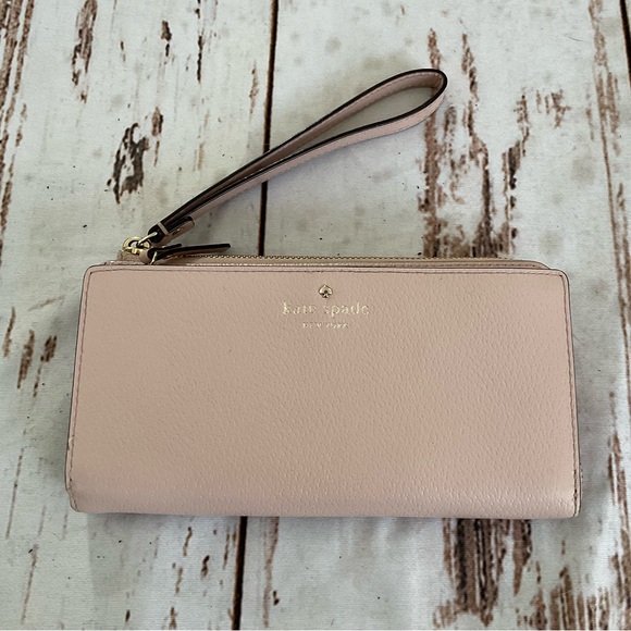kate spade Handbags - KATE SPADE BLUSH PINK‎ LARGE WRISTLET WALLET